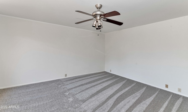 unfurnished room featuring carpet floors and ceiling fan