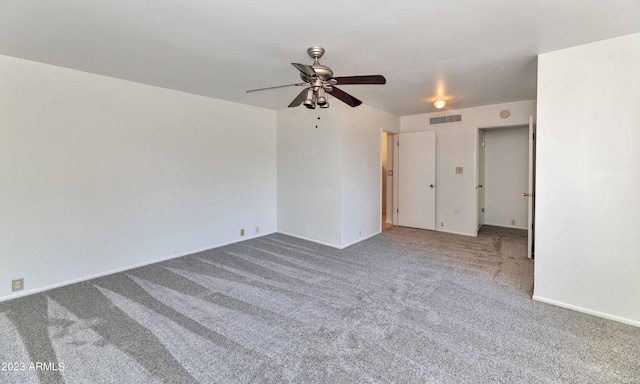 empty room featuring carpet and ceiling fan