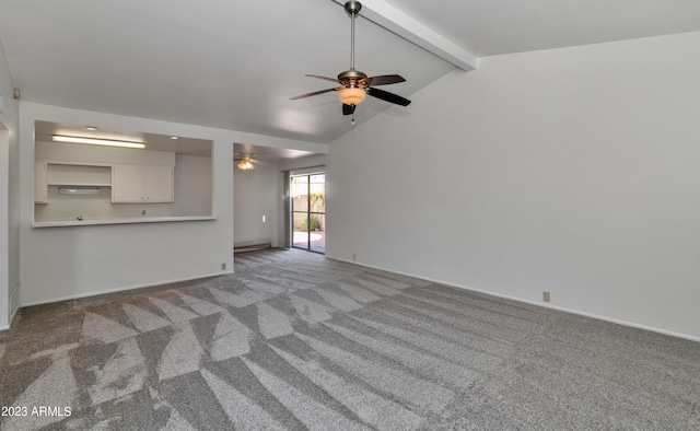 unfurnished living room featuring ceiling fan, carpet flooring, and vaulted ceiling with beams