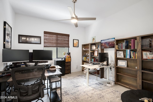 office featuring light wood-type flooring and ceiling fan