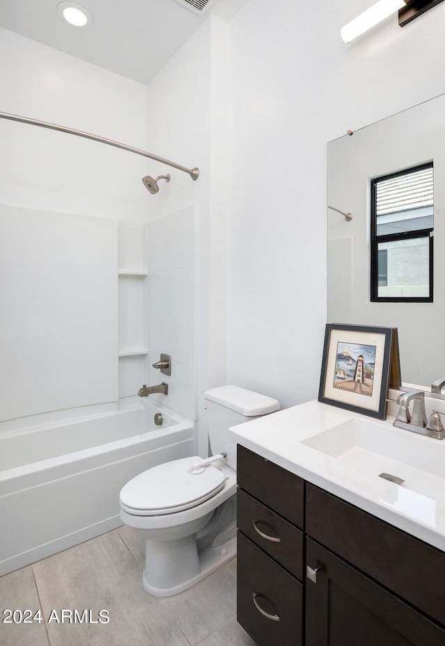 full bathroom featuring vanity, shower / washtub combination, toilet, and tile patterned flooring