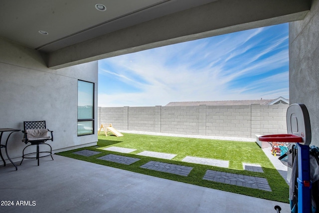 view of yard with a fenced backyard and a patio area
