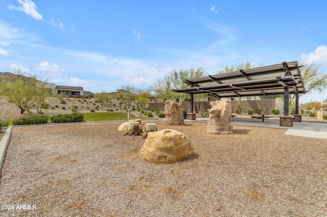 view of yard with a patio area and a pergola