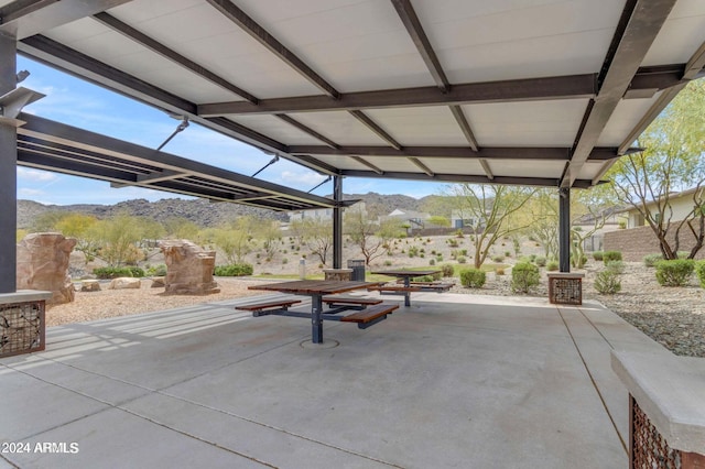 view of patio / terrace featuring a mountain view