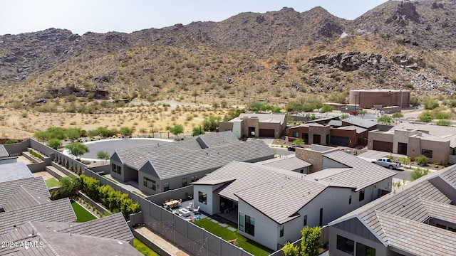 birds eye view of property with a residential view and a mountain view