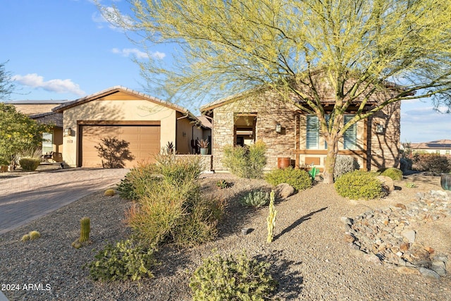 view of front of home featuring a garage