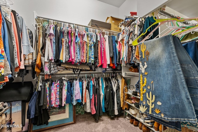 spacious closet with carpet flooring