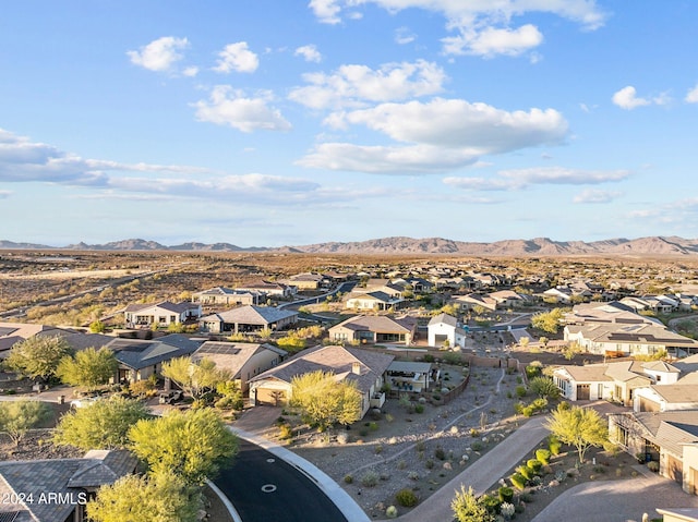 birds eye view of property featuring a mountain view