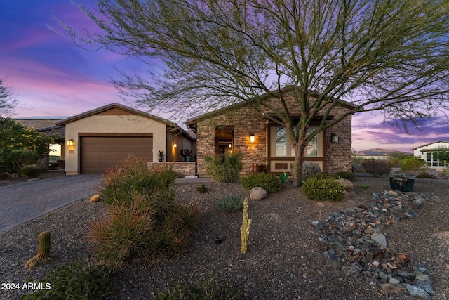 view of front of house with a garage