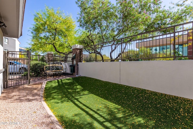 view of yard featuring fence