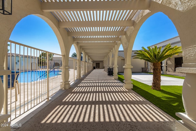 view of patio / terrace featuring a community pool