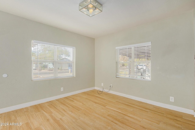 empty room featuring hardwood / wood-style floors