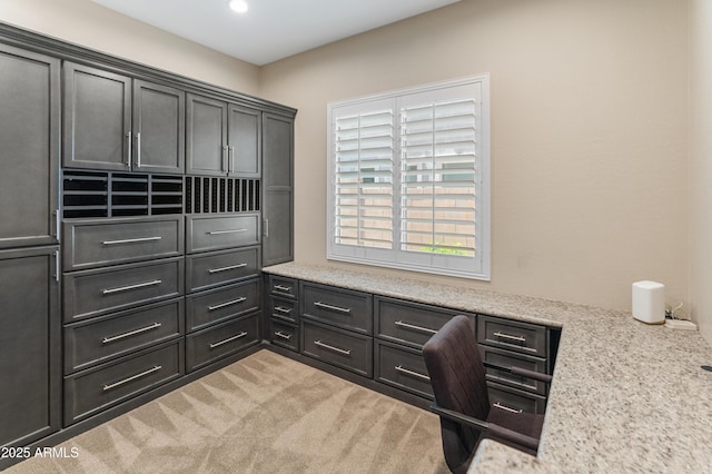 unfurnished office featuring recessed lighting and carpet