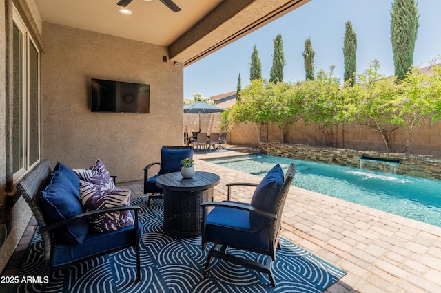 view of patio with ceiling fan, a fenced backyard, outdoor dining space, and an outdoor living space