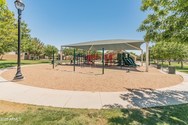 community play area featuring a yard