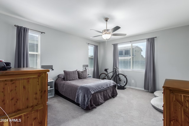 bedroom featuring ceiling fan and carpet floors