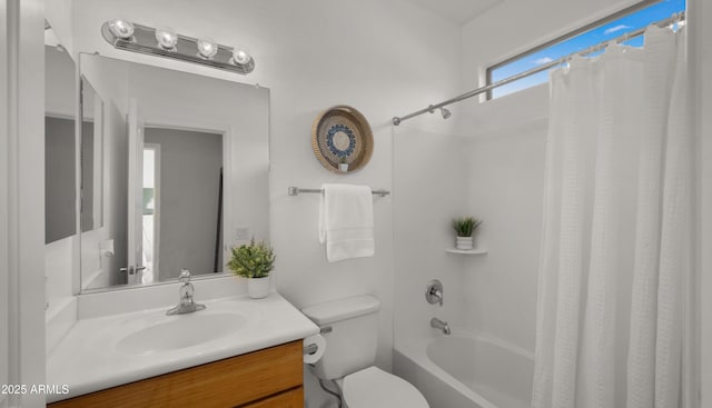 bathroom featuring shower / bath combo, vanity, and toilet