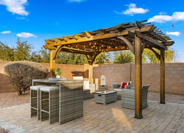 view of patio / terrace featuring an outdoor fire pit, a fenced backyard, and a pergola