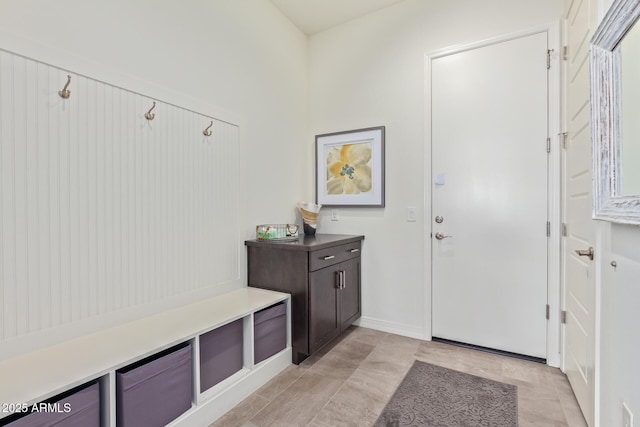 mudroom with light tile patterned floors