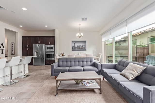 living room with a chandelier