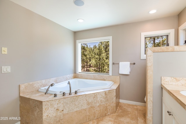 5240 Sierra Vis, Flagstaff, AZ 86001 - bathroom with vanity, a garden tub, baseboards, and tile patterned floors