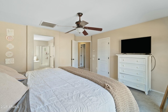 carpeted bedroom featuring ceiling fan and ensuite bathroom