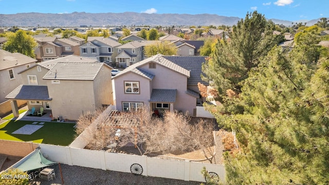 birds eye view of property featuring a mountain view