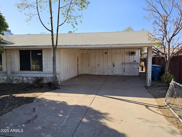 exterior space featuring a carport