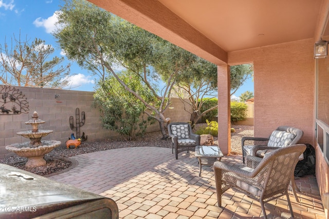view of patio featuring a fenced backyard
