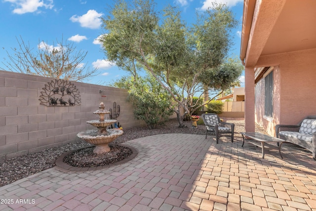 view of patio with a fenced backyard