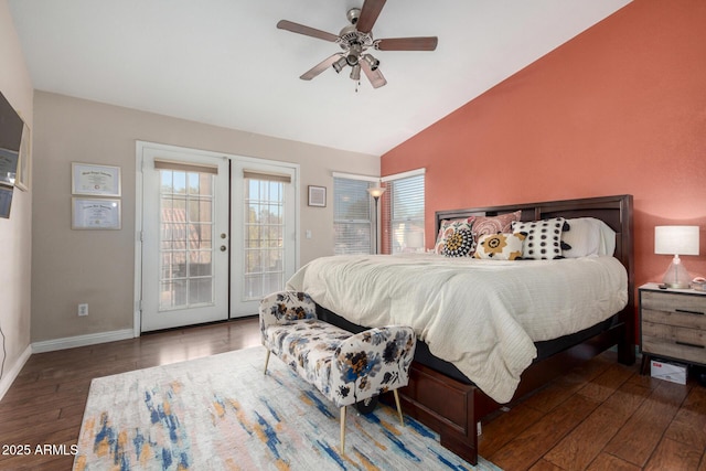 bedroom with dark wood-type flooring, ceiling fan, access to exterior, vaulted ceiling, and french doors