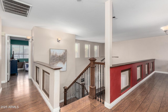 hallway featuring dark hardwood / wood-style flooring