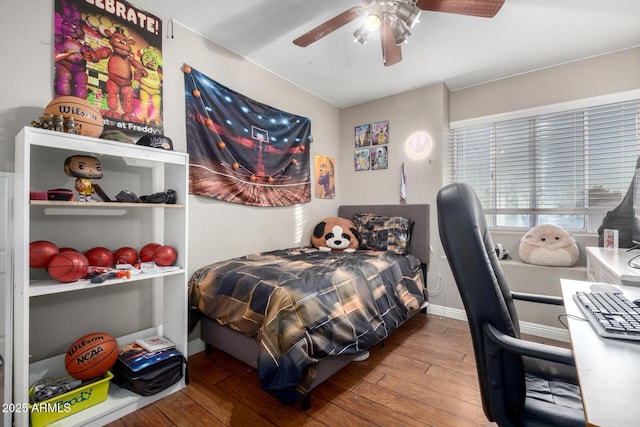 bedroom featuring ceiling fan and wood-type flooring