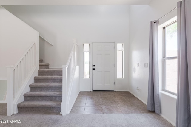 entrance foyer with light tile patterned flooring