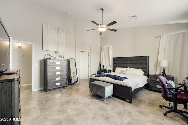 bedroom featuring high vaulted ceiling, visible vents, and a ceiling fan