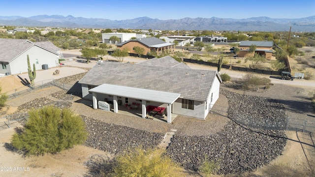 birds eye view of property featuring a residential view and a mountain view