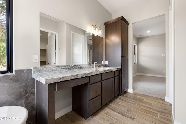 5630 E Norma Dr, Prescott Valley, AZ 86315 - full bathroom with wood finished floors, a soaking tub, and vanity