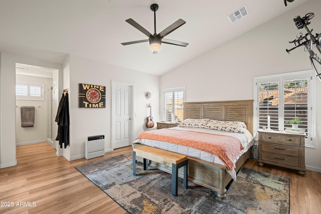 4029 N 160th Dr, Goodyear, AZ 85395 - bedroom with light wood-style floors, multiple windows, high vaulted ceiling, and a ceiling fan