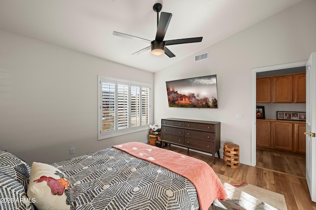4029 N 160th Dr, Goodyear, AZ 85395 - bedroom with wood finished floors, lofted ceiling, and ceiling fan