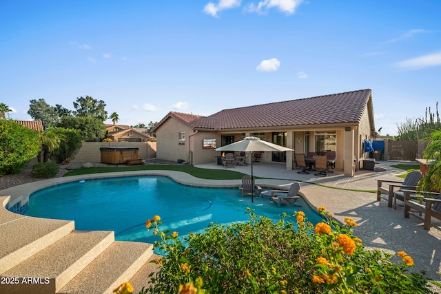 4029 N 160th Dr, Goodyear, AZ 85395 - view of pool with a hot tub, a patio, and a fenced backyard