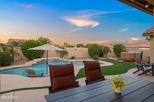 4029 N 160th Dr, Goodyear, AZ 85395 - view of pool with a patio, a fenced backyard, outdoor dining area, and a hot tub