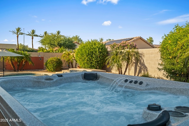 4029 N 160th Dr, Goodyear, AZ 85395 - view of swimming pool featuring a fenced backyard and a hot tub