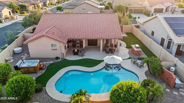 4029 N 160th Dr, Goodyear, AZ 85395 - view of swimming pool with a residential view, a fenced backyard, a patio area, and outdoor dining space