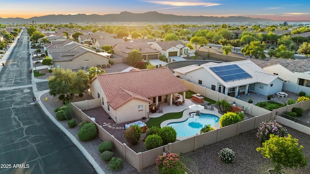 4029 N 160th Dr, Goodyear, AZ 85395 - aerial perspective of suburban area with a pool area and mountains