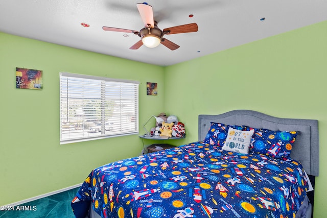 bedroom featuring carpet floors and ceiling fan