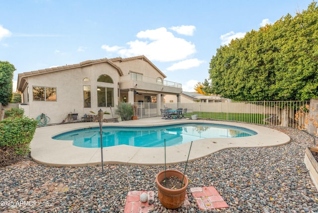 view of pool featuring a patio