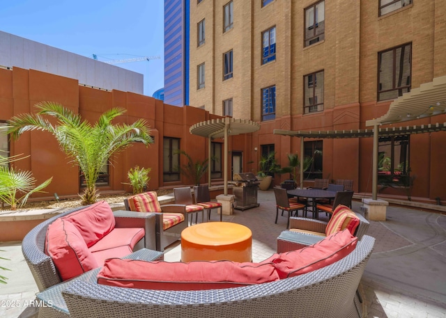 114 W Adams St Unit 907, Phoenix, AZ 85003 - view of patio / terrace featuring an outdoor living space