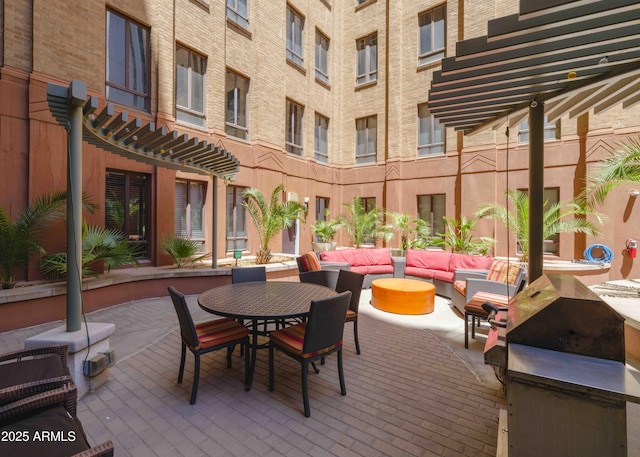 114 W Adams St Unit 907, Phoenix, AZ 85003 - view of patio featuring an outdoor hangout area and outdoor dining space