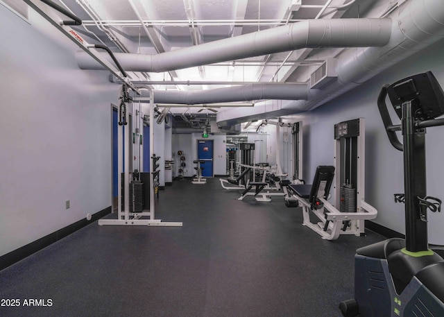 114 W Adams St Unit 907, Phoenix, AZ 85003 - exercise room featuring baseboards