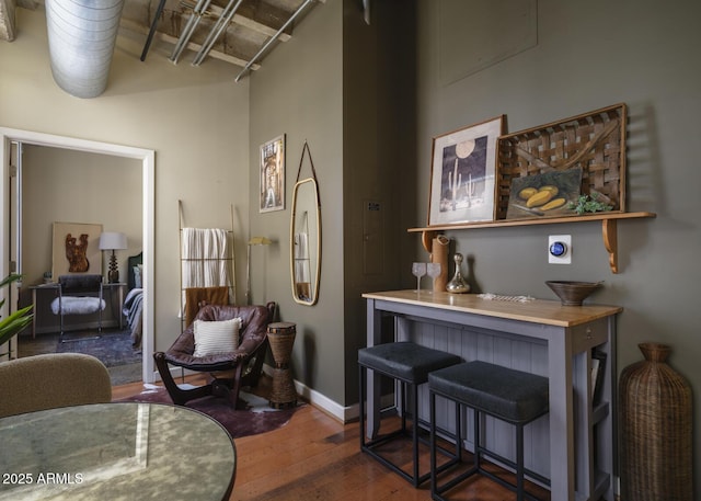 114 W Adams St Unit 907, Phoenix, AZ 85003 - living area featuring hardwood / wood-style floors and baseboards